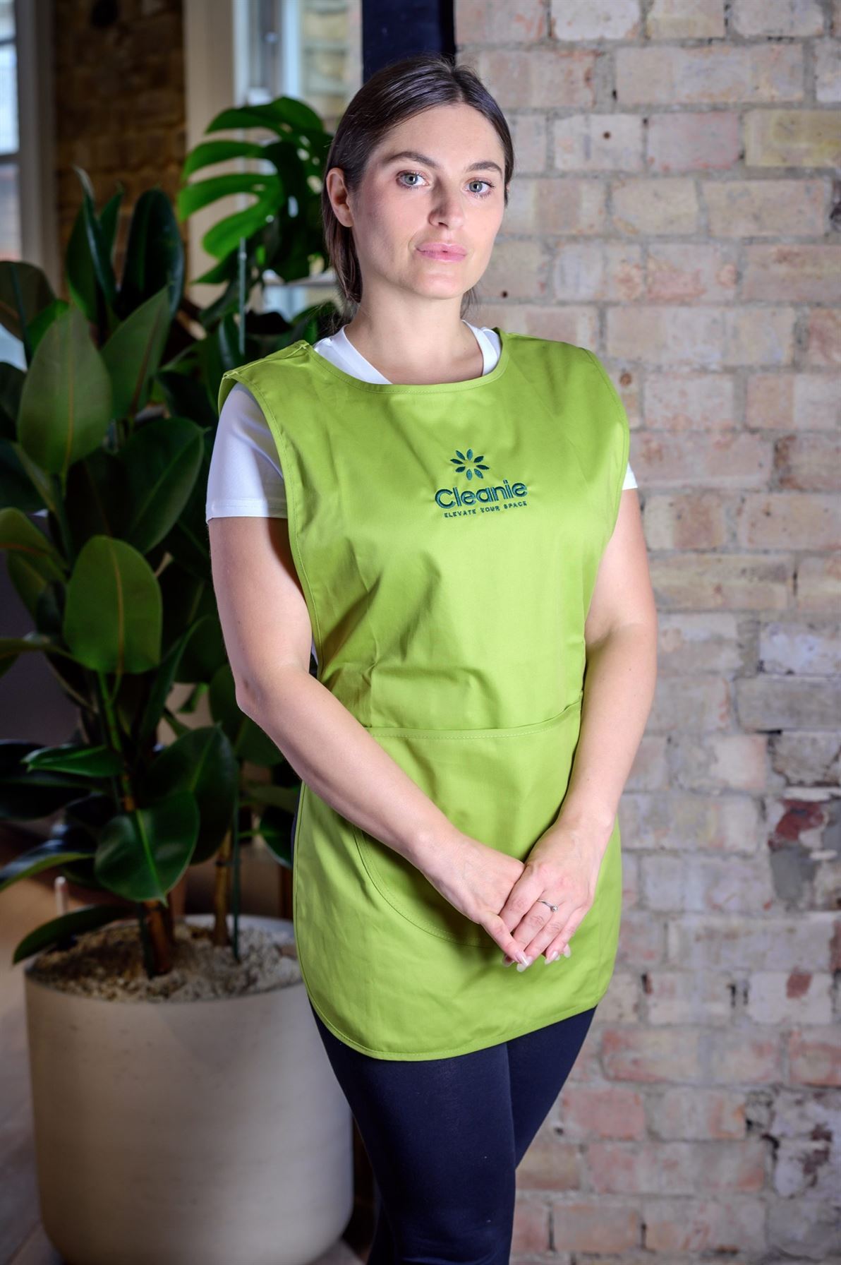 Professional cleaner at work with Cleanie services